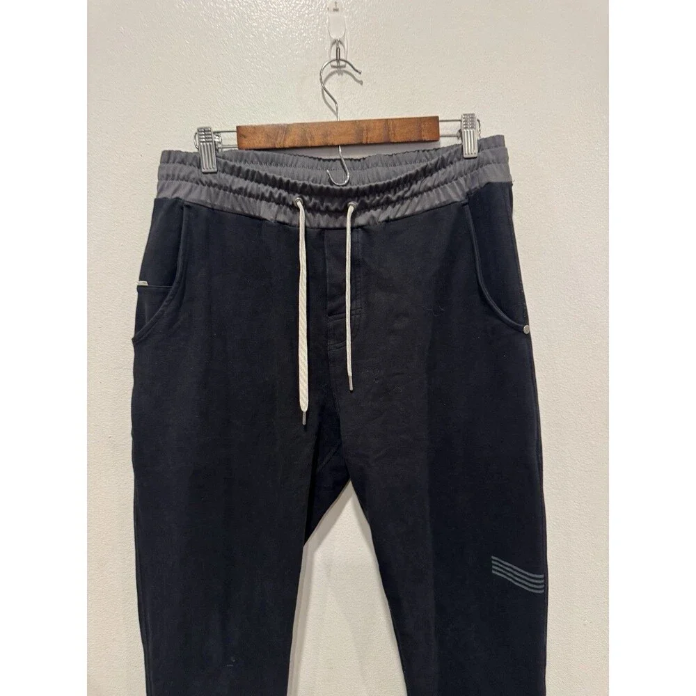 Vuori Balboa Jogger Pant Mens size L dark navy with black waistband  Sweatpant